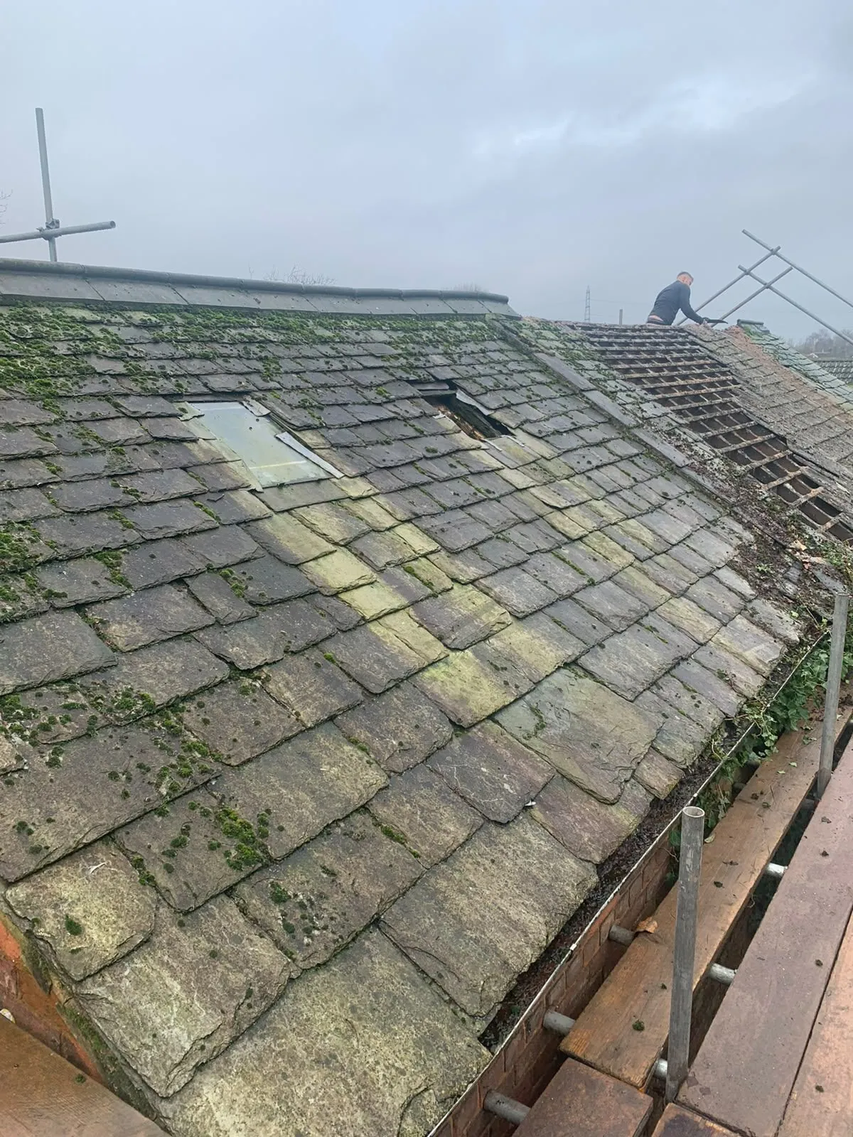 Damaged roof before replacement in Selby